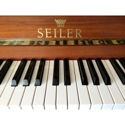 PIANO DROIT OCCASION SEILER 122 KONSOLE Noir Brillant